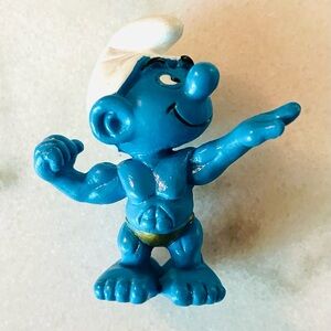 20417 RARE and collectable Flexing Bodybuilder Smurf Vintage RARE find 1993.Gold